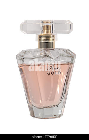 Avon seltene Gold Parfüm in einer klaren Glasflasche auf weißem Hintergrund Stockfoto
