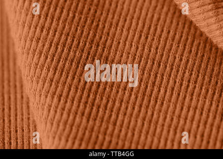 Hellbraune Farbe Textil Textur hautnah. Zusammenfassung Hintergrund Stockfoto