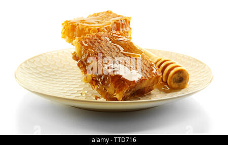 Waben auf Platte auf Weiß isoliert Stockfoto