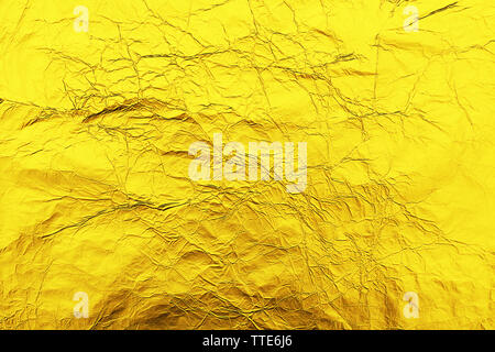 Golden zerknitterte Folie Hintergrund Stockfoto