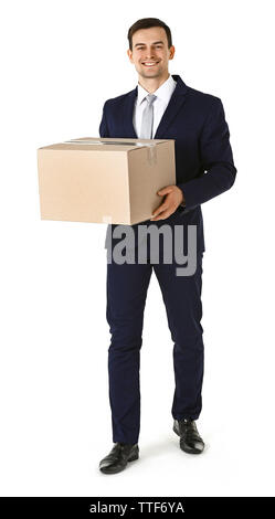 Mann in Anzug holding Kartons auf weißem Hintergrund Stockfoto