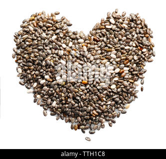 Chia Samen in Herzform, isoliert auf weißem Stockfoto