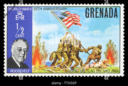 GRENADA - circa 1970: Stempel in Grenada gedruckt zeigt ein Porträt der USA Präsident Roosevelt, der Zweite Weltkrieg 25. Jahrestag, circa 1970. Stockfoto