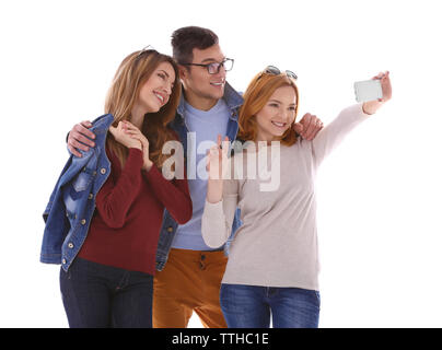 Junge Leute, die mit dem Mobiltelefon selfie isoliert auf weißem Stockfoto