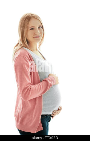 Schwangere Frau auf hellen Hintergrund Stockfoto