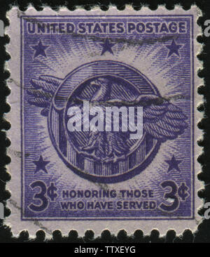 UNITED STATES - ca. 1945: Briefmarke von United States gedruckt, zeigt Herrn Abgeordneten Entlastung Emblem, circa 1945. Stockfoto