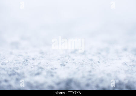 Schneefall bedeckt Textur Hintergrund im Winter Stockfoto