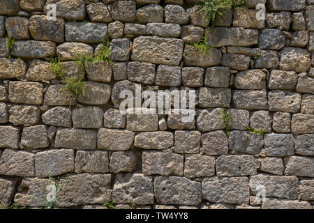 Hintergrund der Mauer, die von der alten armenischen Gebäude Stockfoto