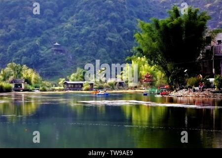 Gans Frühling ist eine landschaftlich wunderschöne Ort in Guangxi. Die Berge und Flüsse sind wunderschön. Am Morgen die Sonne scheint auf die Willow Bambus Wald am Fluss. Stockfoto