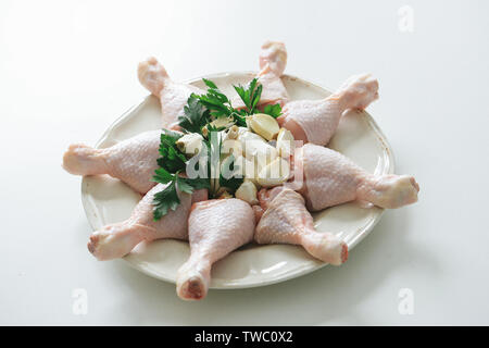 Hähnchenkeulen mit Knoblauch Stockfoto