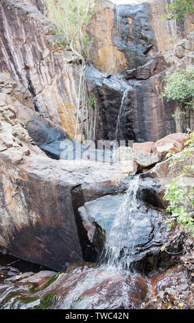 Atemberaubende cascading Robin fällt Wasserfall die Felswand im Northern Territory von Australien Stockfoto