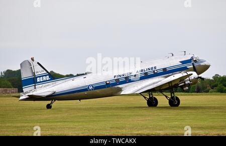 Finnische Airlines DC-3 Dakota am Daks über der Normandie Airshow Duxford zum Gedenken an den 75. Jahrestag des D-Day am 4. Juni 2019 Stockfoto