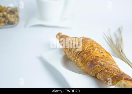 Tea time croissant Pause Stockfoto