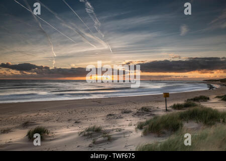 Sonnenaufgang am Meer Palling in Norfolk. Stockfoto