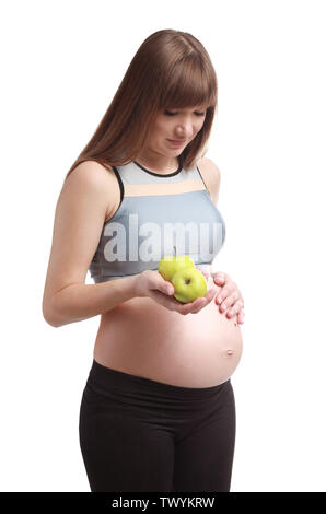 Schöne schwangere Frau mit Äpfeln auf weißem Hintergrund Stockfoto