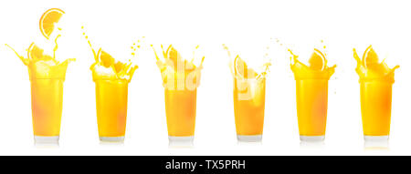 Glas Orangensaft mit Splash von sinkenden Orange Slice Stockfoto