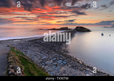 Sonnenuntergang über Bude Wellenbrecher Stockfoto