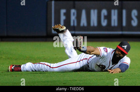 Atlanta Braves rechter Feldspieler Jason Heyward die Fänge auf einer Linie fahren von Philadelphia Phillies' Ryan Howard im neunten Inning in Turner Field, Atlanta, 18. Juli 2014. Atlanta gewann das Spiel 6-4 und Kimbrel eingekerbt sein 30. außer der Saison. UPI/David Tulis Stockfoto