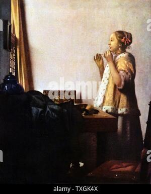 Gemälde mit dem Titel "Perlenkette" von Johannes Vermeer (1632-1675) eines niederländischen Malers, spezialisiert auf inländische Innenaufnahmen. Vom 17. Jahrhundert Stockfoto