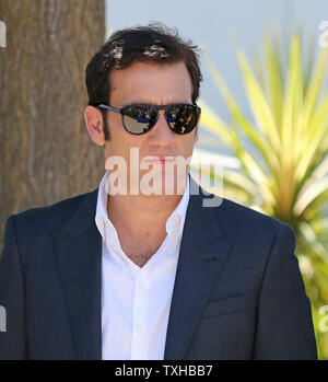 Clive Owen kommt an ein Foto für den Film "Blood Ties" während die 66. jährliche Internationale Filmfestspiele von Cannes in Cannes, Frankreich am 20. Mai 2013. UPI/David Silpa Stockfoto