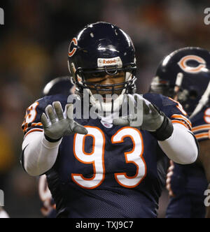 Chicago Bears defensive Ende Adewale Ogunleye (93) Anträge zum Nebenerwerb im ersten Quartal bei Soldier Field am 22. Dezember in Chicago 2008. Die Bären gewannen 20-17 in den überstunden. (UPI Foto/Brian Kersey) Stockfoto