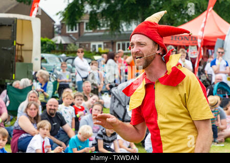 James der Narr von Chester und 2019 Lymm historischen Transport Tag ausführen Stockfoto