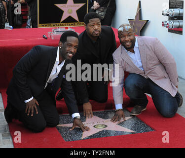 Boyz II Men Mitglieder Shawn Stockman, Nathan Morris und Wanya Morris (L-R) pose während einer enthüllungsfeier sie ehrt mit dem 2.452 nd Stern auf dem Hollywood Walk of Fame in Los Angeles am 5. Januar 2012. UPI/Jim Ruymen Stockfoto