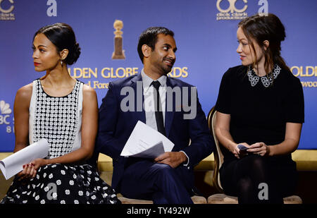 Darsteller Zoe Saldana, Aziiz Ansari und Olivia Wilde (L-R) für die 71. jährlichen Golden Globe Awards Nominierungen Ankündigungen im Beverly Hilton Hotel in Beverly Hills, Kalifornien am 12. Dezember 2013 vorbereiten. Die Gewinner werden bei der NBC-Fernsehsendung am 12. Januar 2014 bekannt gegeben. UPI/Jim Ruymen Stockfoto