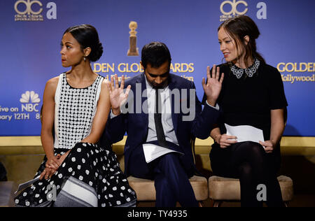 Darsteller Zoe Saldana, Aziiz Ansari und Olivia Wilde (L-R) für die 71. jährlichen Golden Globe Awards Nominierungen Ankündigungen im Beverly Hilton Hotel in Beverly Hills, Kalifornien am 12. Dezember 2013 vorbereiten. Die Gewinner werden bei der NBC-Fernsehsendung am 12. Januar 2014 bekannt gegeben. UPI/Jim Ruymen Stockfoto