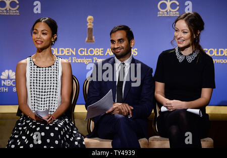 Darsteller Zoe Saldana, Aziiz Ansari und Olivia Wilde (L-R) für die 71. jährlichen Golden Globe Awards Nominierungen Ankündigungen im Beverly Hilton Hotel in Beverly Hills, Kalifornien am 12. Dezember 2013 vorbereiten. Die Gewinner werden bei der NBC-Fernsehsendung am 12. Januar 2014 bekannt gegeben. UPI/Jim Ruymen Stockfoto