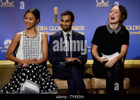 Darsteller Zoe Saldana, Aziiz Ansari und Olivia Wilde für die 71. jährlichen Golden Globe Awards Nominierungen Ankündigungen im Beverly Hilton Hotel in Beverly Hills, Kalifornien am 12. Dezember 2013 vorbereiten. Die Gewinner werden bei der NBC-Fernsehsendung am 12. Januar 2014 bekannt gegeben. UPI/Jim Ruymen Stockfoto