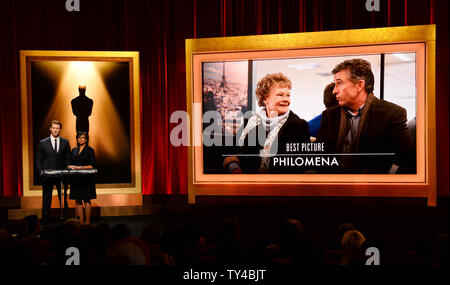 Die Oscar Nominierungen für beste Bild inklusive "Philomena" angekündigt, von dem Schauspieler Chris Hemsworth (L) und der Akademie der Künste und Wissenschaften Präsident Cheryl Boone Isaacs am Samuel Goldwyn Theater in Beverly Hills, Kalifornien am 16. Januar 2014. Die 86. jährlichen Academy Awards findet am 2. März. UPI/Jim Ruymen Stockfoto