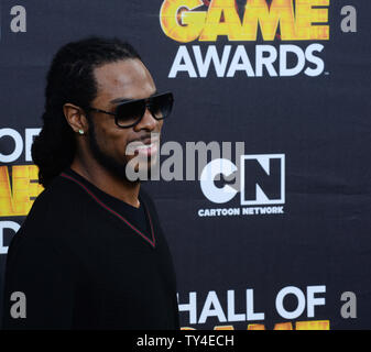 NFL Spieler Richard Sherman der Seattle Seahawks besucht Cartoon Network der vierten jährlichen Hall of Game Awards an Barker Hangar in Santa Monica, Kalifornien am 15. Februar 2014. UPI/Jim Ruymen Stockfoto