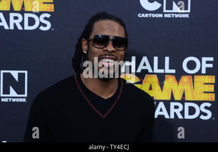 NFL Spieler Richard Sherman der Seattle Seahawks besucht Cartoon Network der vierten jährlichen Hall of Game Awards an Barker Hangar in Santa Monica, Kalifornien am 15. Februar 2014. UPI/Jim Ruymen Stockfoto