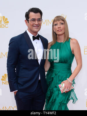 Schauspieler Ty Burrell (L) und Holly Anne Braun kommen in der Primetime Emmy Awards im Nokia Theater in Los Angeles am 25 August, 2014. UPI/Jim Ruymen Stockfoto