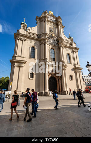 Fassade der Heiliggeistkirche, Heilig Geist Kirche (Kirche der Heiligen Geist) in der Innenstadt von München, zwischen Marienplatz und Viktualienmarkt Stockfoto