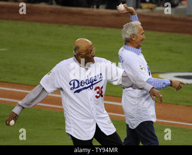 Sandy Koufax, of the Los Angeles Dodgers dandy portsider, pushes