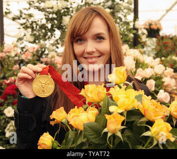 Victoria Pendleton Olympischen radfahren Goldmedaillenträger Posen in den Blumen auf der Chelsea Flower Show 2009 in London am Montag, den 18. Mai 2009. (UPI Foto/Hugo Philpott) Stockfoto