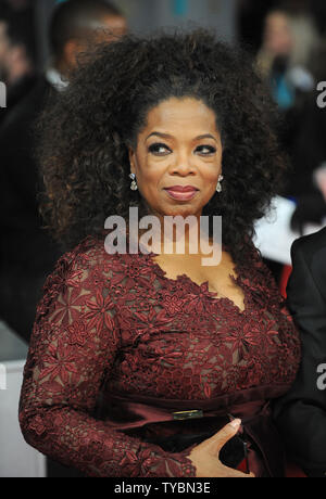 Die amerikanischen Medien mit der Inhaberin, Talk Show Host, Schauspielerin, Produzentin, und Philanthrop Oprah Winfrey besucht die EE British Academy Film Awards 2014 am Royal Opera House in London am 16. Februar 2014. UPI/Paul Treadway Stockfoto