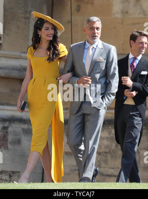 Schauspieler George Clooney und seine Frau, Britische Menschenrechte barrister Amal Clooney, kommen an der St. George's Chapel in Windsor Castle für die königliche Hochzeit Zeremonie des britischen Prinzen Harry und Meghan Markle, Windsor in England, am 19. Mai 2018. Foto von Hugo Philpott/UPI Stockfoto