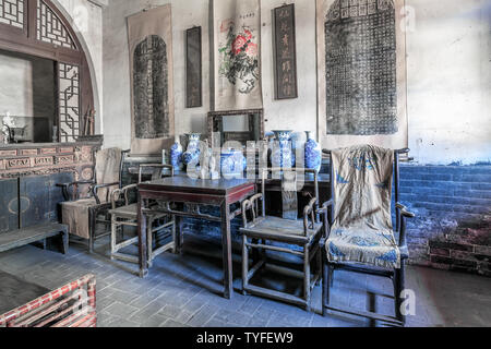 Innere Blick auf Wohnhäuser in der Ming und Qing Dynastien, Chinesischen klassischen Möbeln. Im Norden Chinas erste Security Bureau Museum in der antiken Stadt Pingyao, Shanxi Provinz fotografiert. Stockfoto