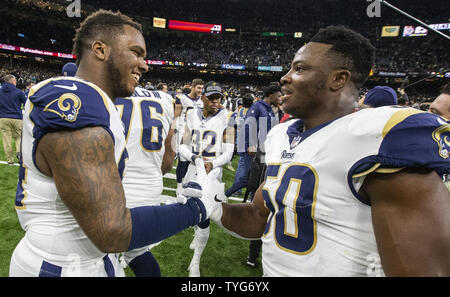 Los Angeles Rams defensive lineman Johannes Franklin-Myers, Links, ad außerhalb linebacker Samson Ebukam (50) feiern den Sieg über die New Orleans Saints im NFC Championship am Mercedes-Benz Superdome in New Orleans am 20. Januar 2019. Die Rams besiegt die Heiligen 26-23 in den überstunden zum Super Bowl Llll zu bewegen. Foto von Mark Wallheiser/UPI Stockfoto