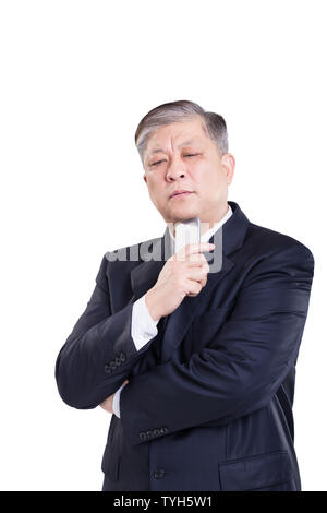 Geste und Pose der alte asiatische Geschäftsmann Stockfoto