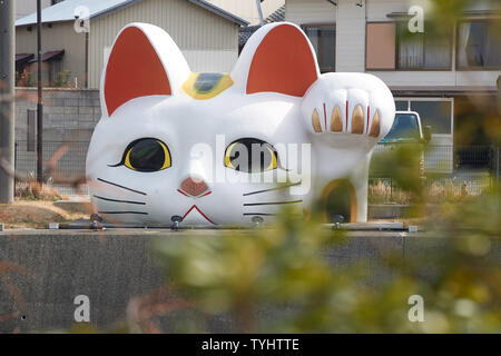 Maneki Neko - Kopf in Tokoname Töpferei Fußweg, in der Nähe von Nagoya Chubu Centrair Flughafen entfernt. Stockfoto