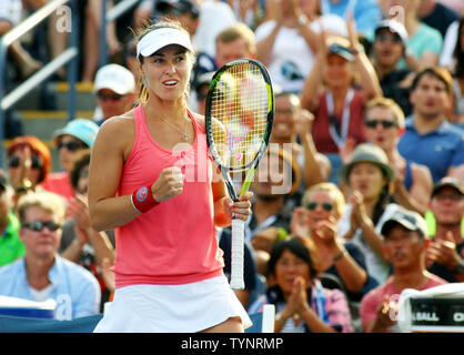 Martina Hingis aus der Schweiz reagiert, nachdem Sie und Mannschaftskamerad Daniela Hantuchova der Slowakei das erste Spiel gegen Sara Errani und Roberta Vinci von Italien während Doppel der Frauen Match gewinnen bei den U.S. Open Championship am USTA Billie Jean King National Tennis Center am 30. August statt, 2013 in New York City. UPI Foto/Monika Graff Stockfoto