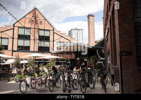 Die Mathallen indoor Lebensmittelmarkt am Vulkan Einkaufszentrum im Stadtteil Grünerløkka von Oslo, Norwegen. Stockfoto