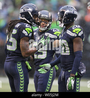 Seattle Seahawks offiziell freigegeben defensive Backs, Richard Sherman (25) und Jeremy Lane (20) Am 9. März 2018 in Seattle. In diesem 2015 Datei foto Richard Sherman (25), Earl Thomas (29) und Jeremy Lane (20) zusammen, während ihr Spiel gegen die St. Louis Rams bei CenturyLink Feld in Seattle, Washington, Unordnung am 27. Dezember 2015. Foto von Jim Bryant/UPI Stockfoto