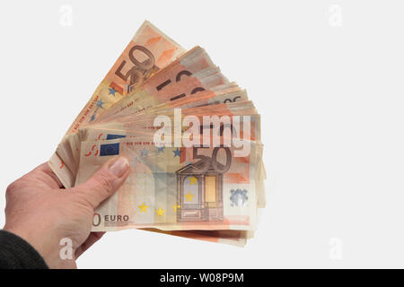 Big Pack von fünfzig Euro Rechnungen in der Hand Stockfoto