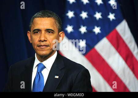 Präsident Barack Obama spricht während einer gemeinsamen Pressekonferenz mit dem irakischen Premierminister Nouri al-Maliki in das Eisenhower Executive Office Building in Washington am 12. Dezember 2011. UPI/Kevin Dietsch Stockfoto