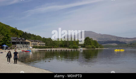 Luss, eine Erhaltung Dorf am Ufer des Loch Lomond wurde im neunzehnten Jahrhundert als Model Village die Schiefergrube und Mühle zu Haus Stockfoto